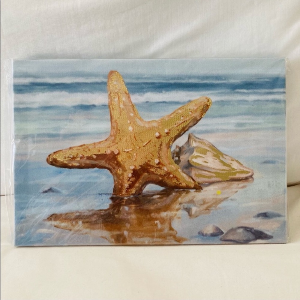 Starfish and seashell on the
beach with gold foil details
canvas wall art